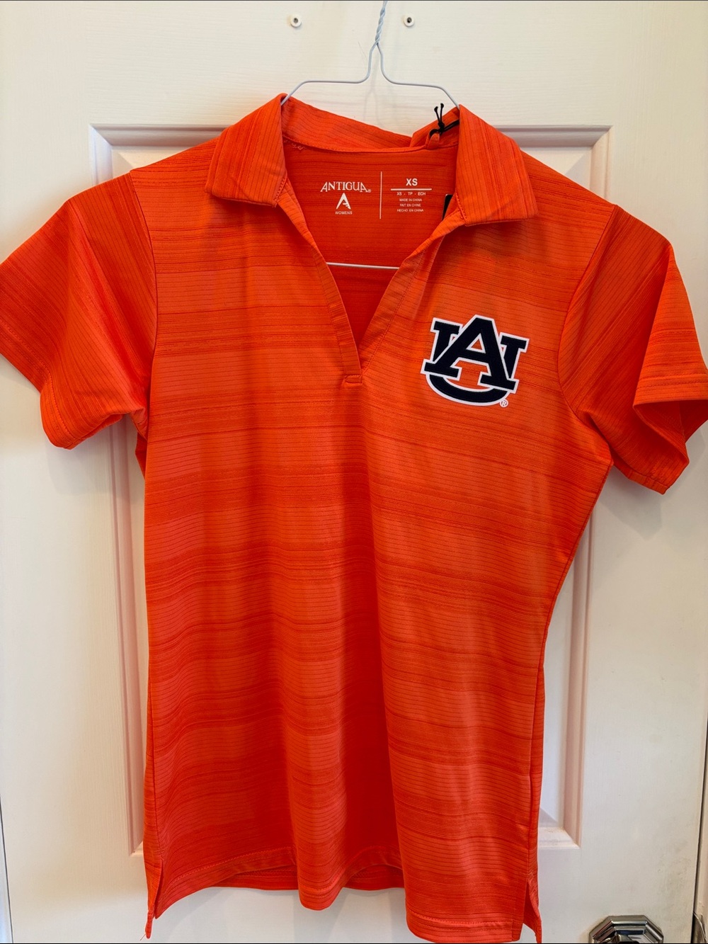 Antigua Women’a Orange Auburn Univeristy Logo Polo